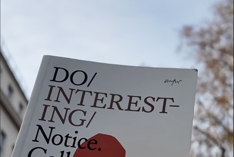 A cropped shot of the cover of the book 'Do Interesting'