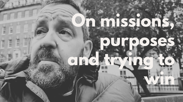 A black and white photo of the author with the words 'on missions, purposes and trying to win'